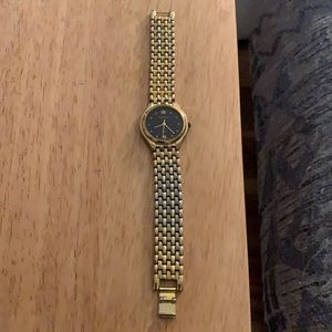 Geneva Quartz men’s gold watch